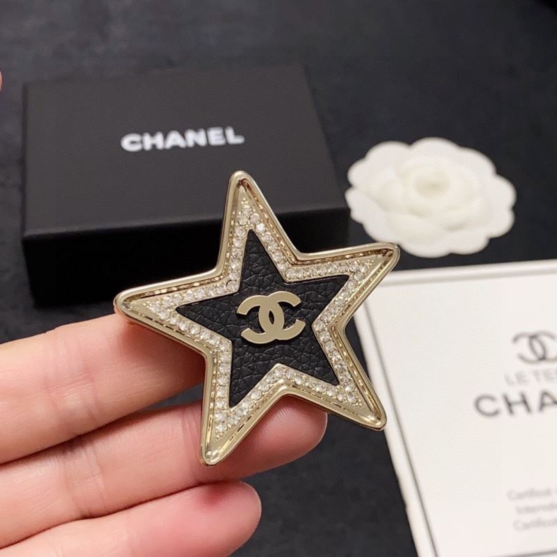Ch**el brooches
